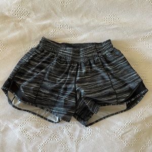 Lululemon, size 6, blue and black striped pattern running short, inside liner